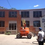 mobile sandblasting a brick building